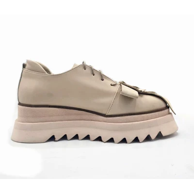 Bow in light beige shoes