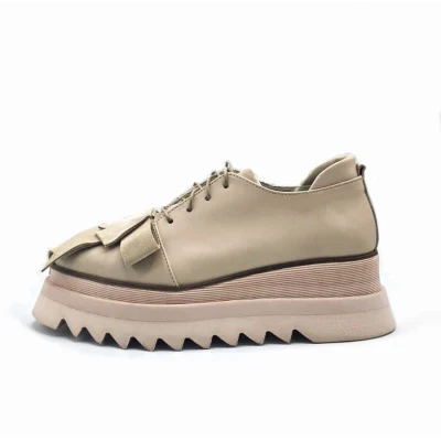 Bow in light beige shoes